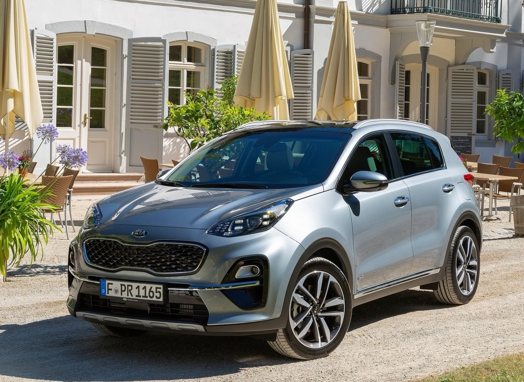 Grp Kia sportage utanför villa